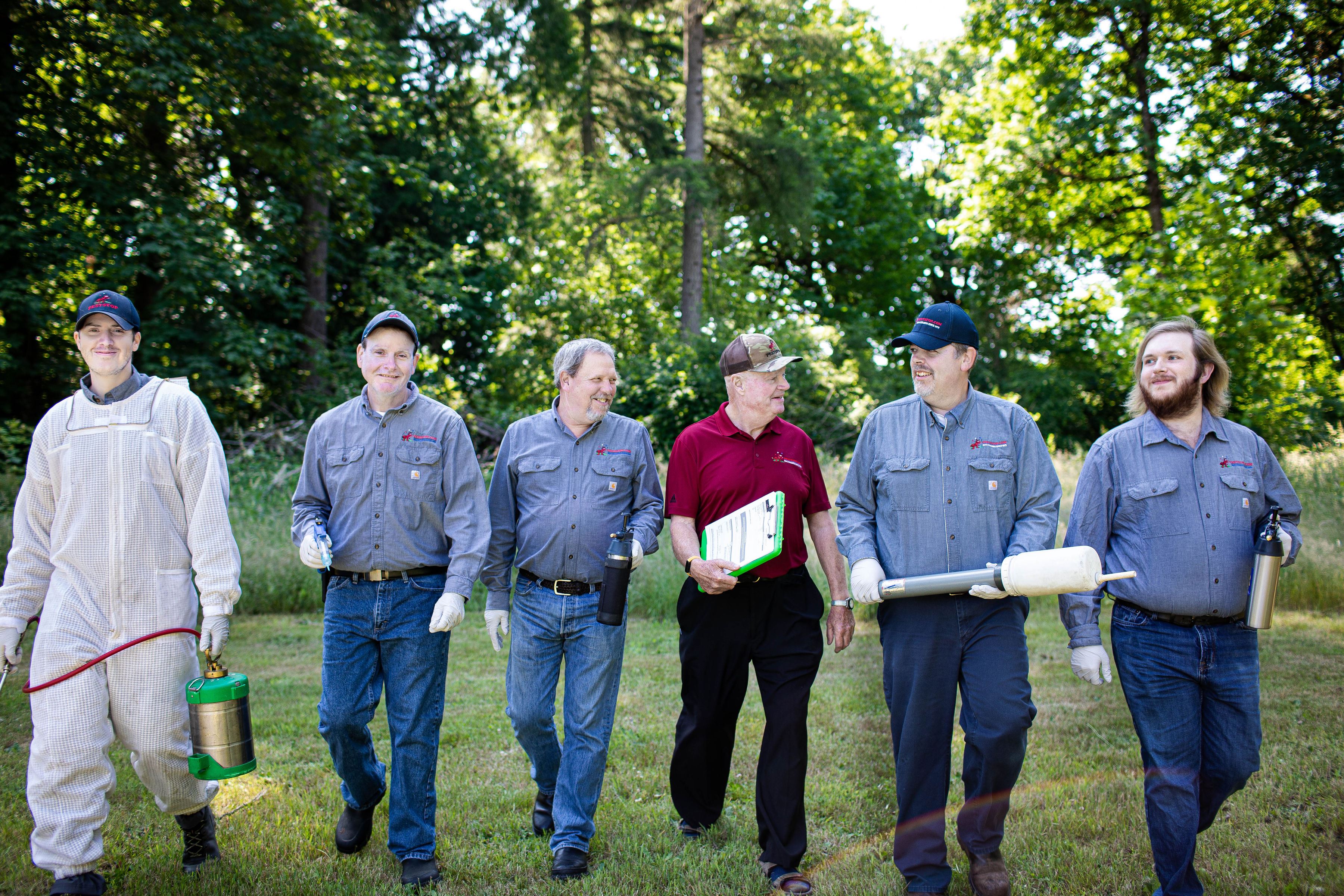 pest technicians walking in a line